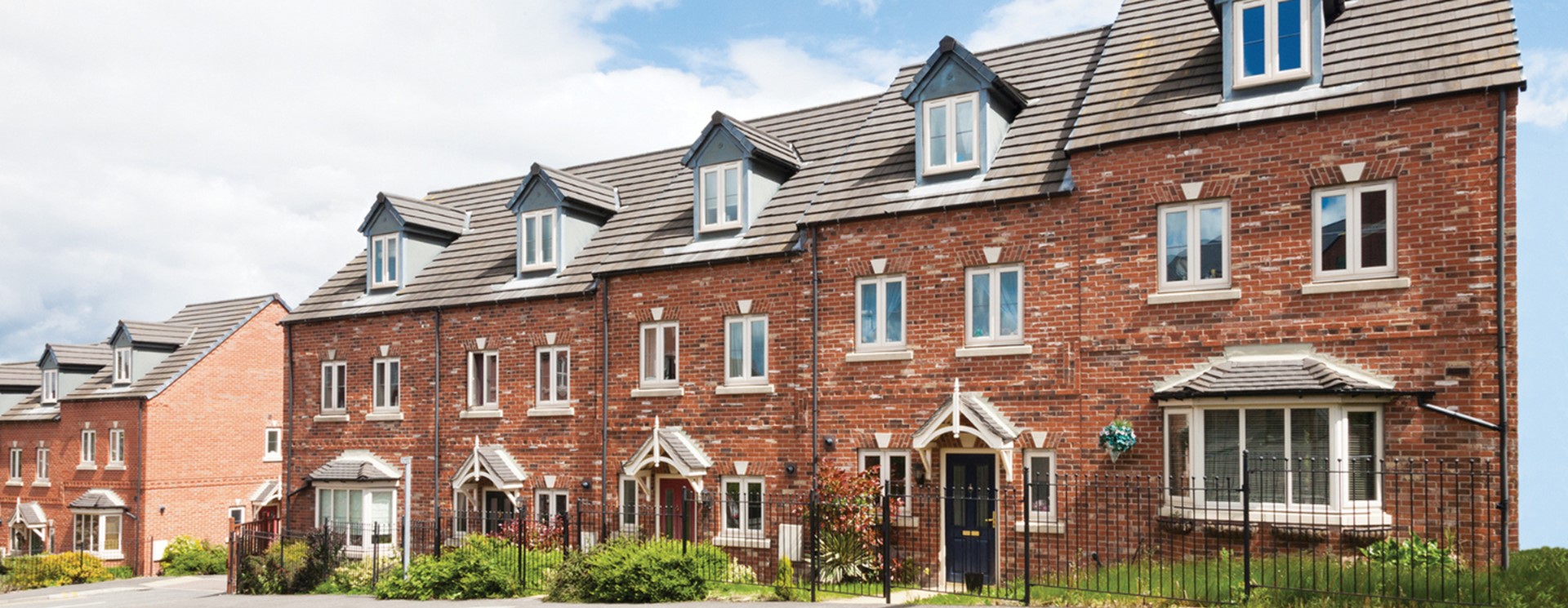 row of homes with smart housing management
