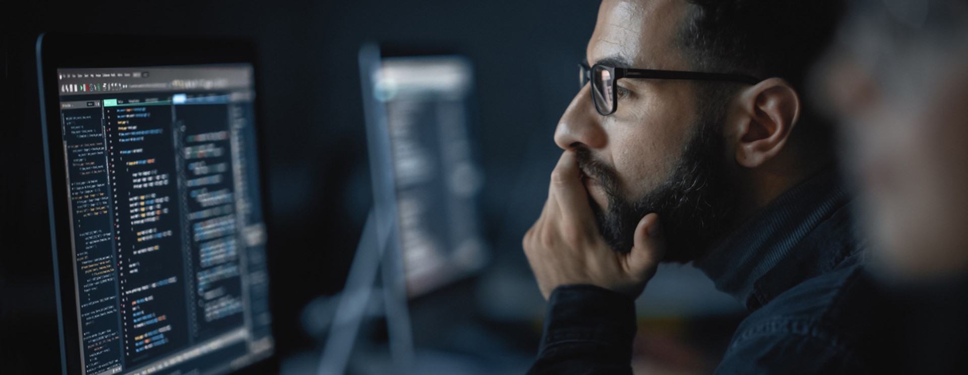 cyber security professional working on computer