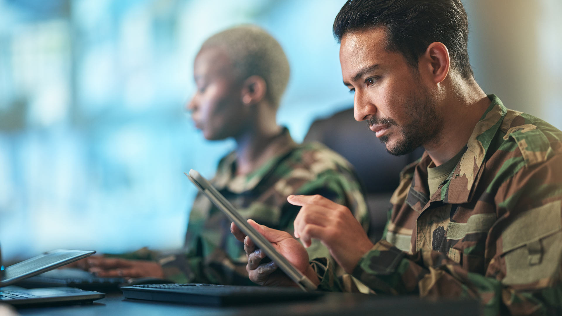 military staff working with IoT in Defence setting
