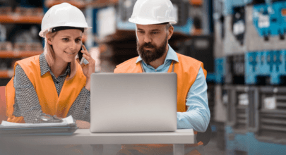 two engineers working on-site