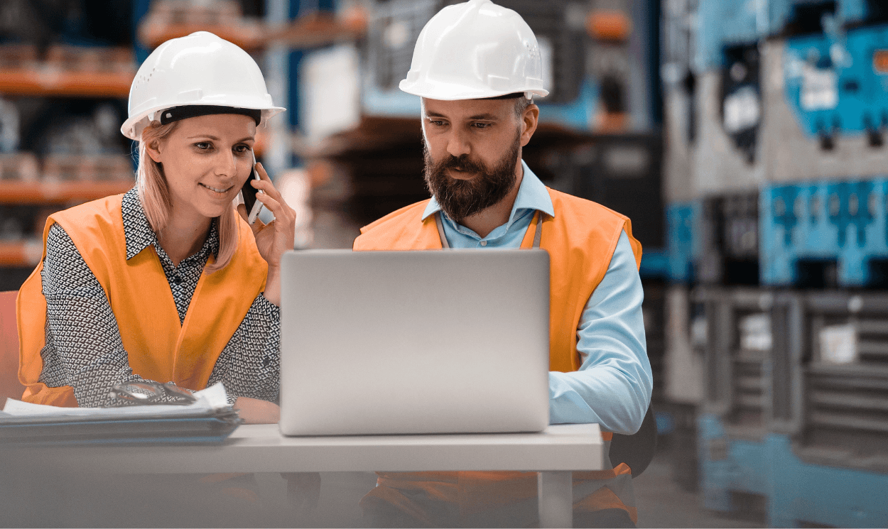 two engineers working on-site